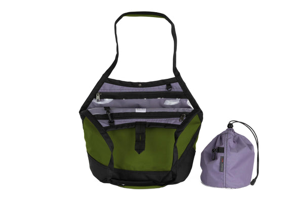The Swift in Saguaro Ballistic with a Dawn (blue-grey with dark blue-grey grid) interior and Medium Yarn Stuff Sack